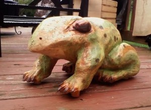 17 lbs, Measures 2' x 12", Chainsaw carved White Pine Amphibian.